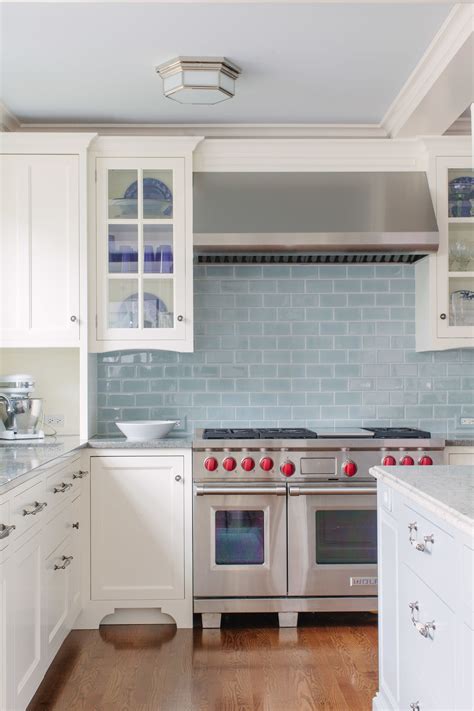 blue backsplash tile cabinet.